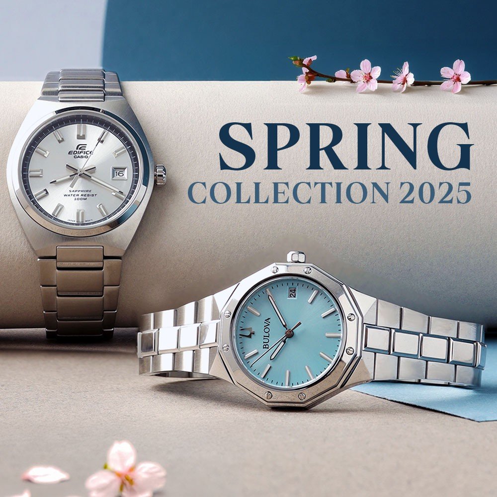 two watches with a cherry blossom branch